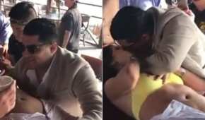 El político aprovechó la circunstancia para besar a la fuerza a la joven