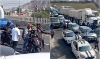 VIDEO: Motociclista ‘salva’ a hombre y su bebé atrapados en bloqueo en la México-Pachuca