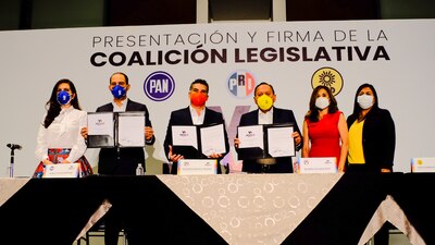 Las tres fuerzas políticas firmaron una coalición legislativa