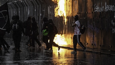 Detienen a hombres por desmanes en la marcha del 8M