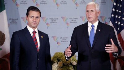 El presidente y el funcionario se reunieron en la VIII Cumbre de las Américas