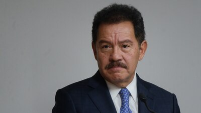 En un evento, el exjefe de Seguridad fue captado con Mier