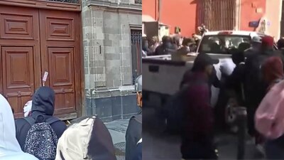Manifestantes buscan hablar con AMLO, sobre la desaparición de los 43