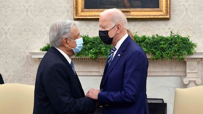 El presidente le explicó a Joe Biden que con una reforma constitucional logró que empresarios se pusieran al día en sus pagos.